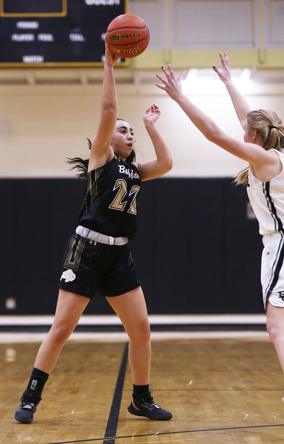 Cantrell Rosalez passes the ball over the head